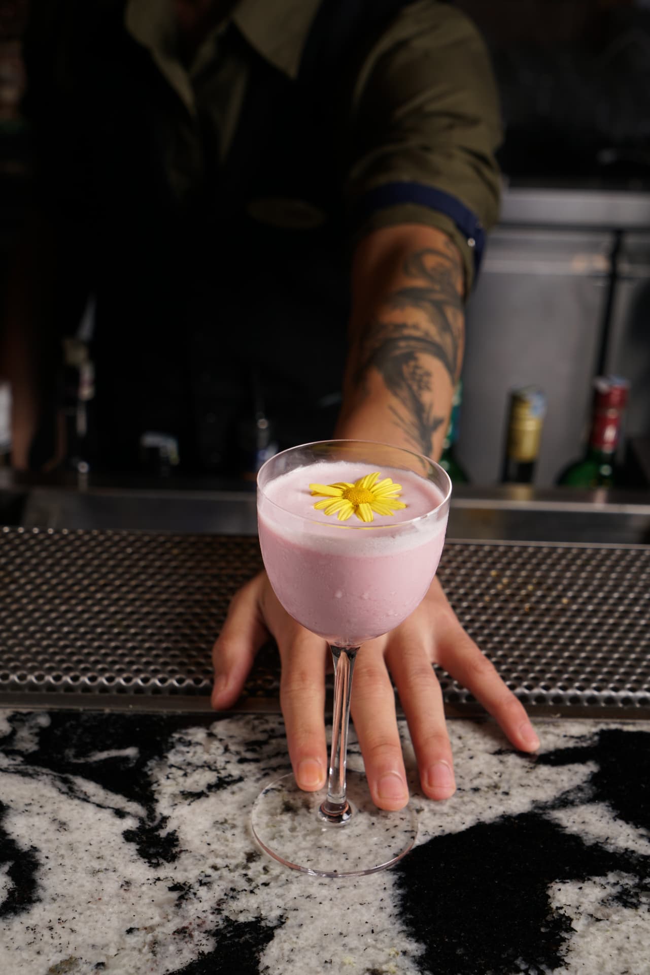 Signature cocktail served in a cut crystal glass at Le Baron Lounge